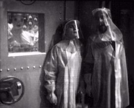 The first of only two good telesnaps featuring Ben and Barclay in radiation suits.